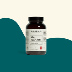 Brown glass jar of Algorigin Organic AFA Klamath, 45 capsules, on a cream and teal background